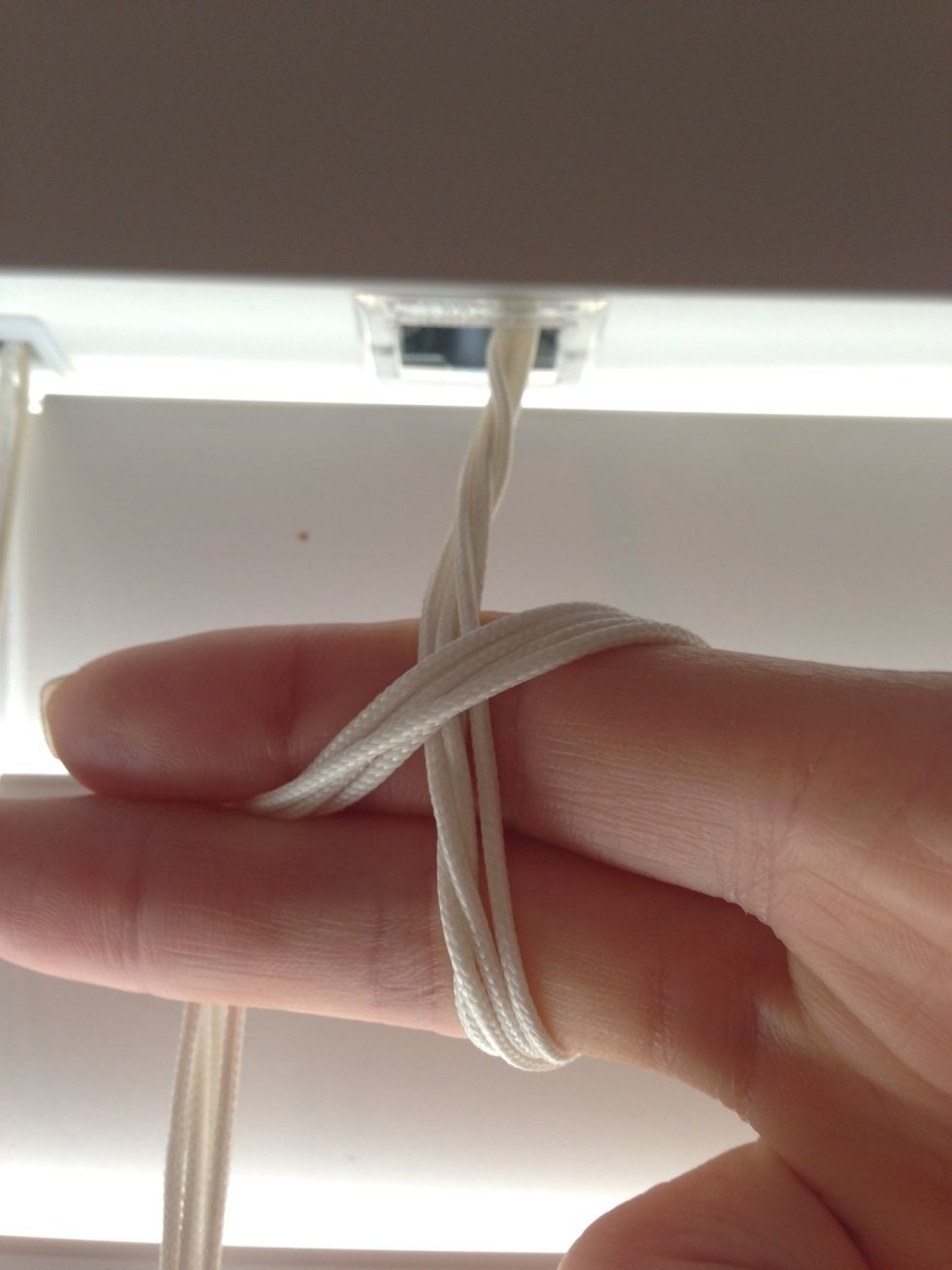 Move ends to between the fingers.
