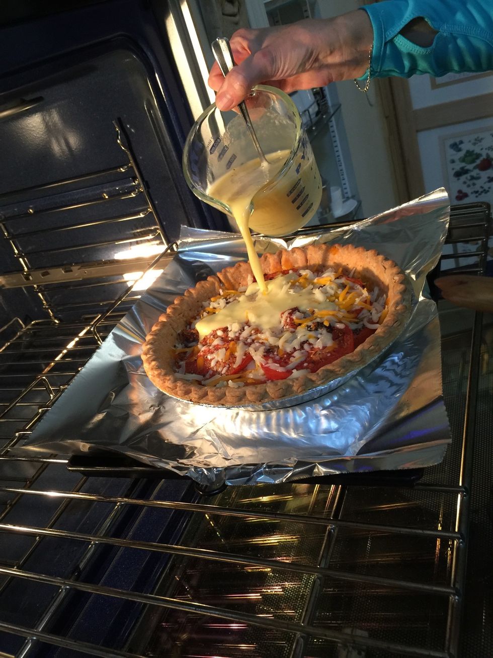 Move the crust to the oven before adding the egg mixture....