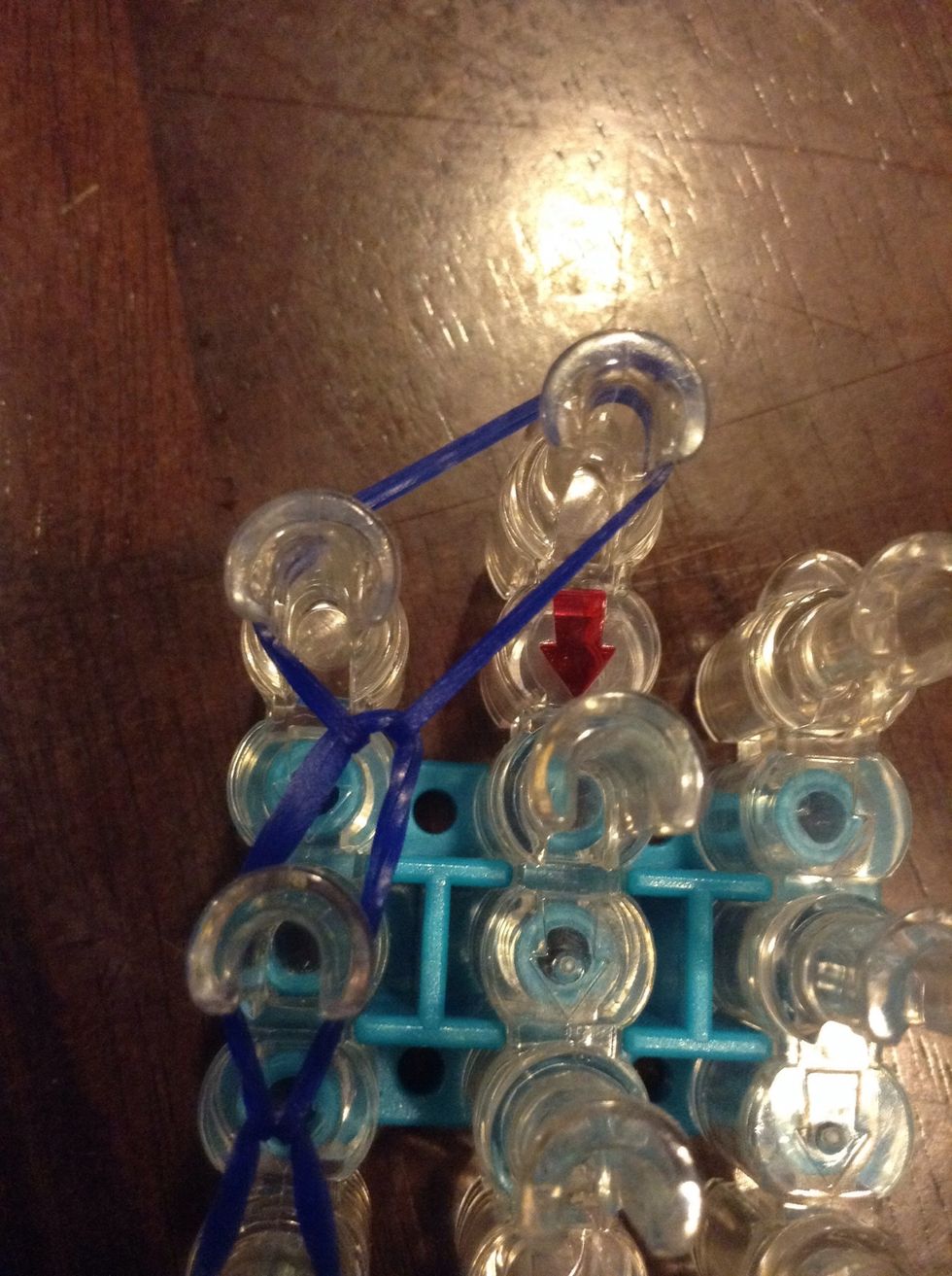 Move the lest hooked rubber band to the loom hook next to it. Then put the C-Clip on that rubber band