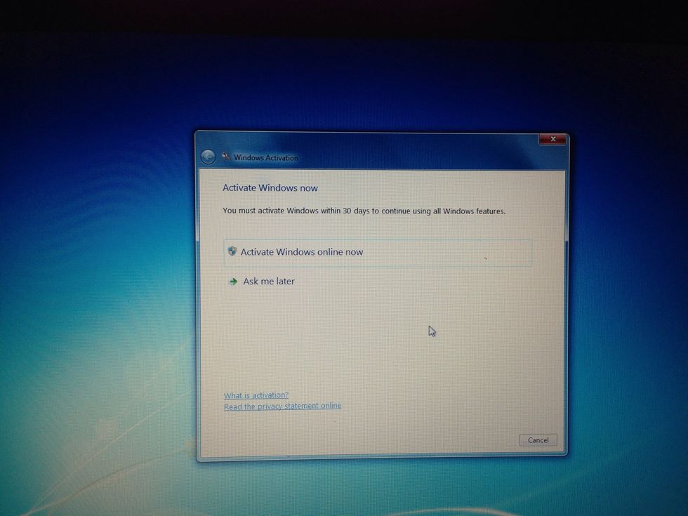 Move the mouse to activate windows online now and left click.