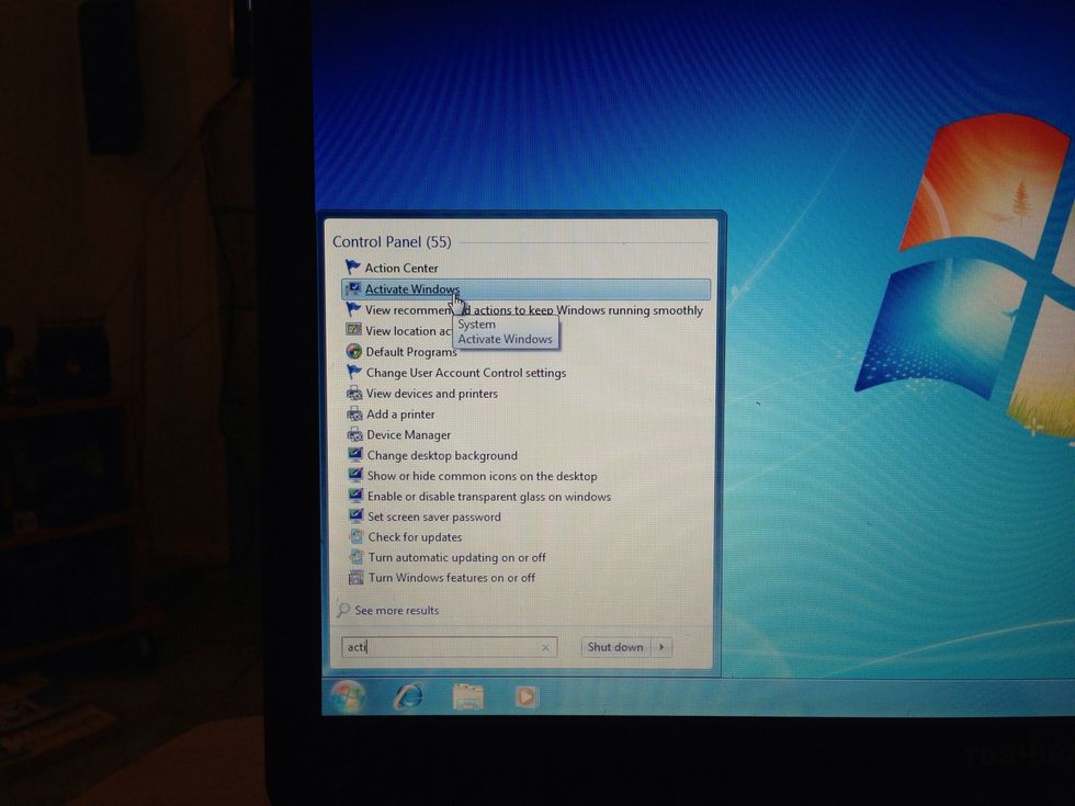 Move the mouse to the activate windows option and left click.
