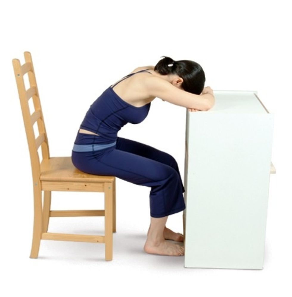 Move your chair close to a table & perform Chair Forward Bend, resting your forearms on the table & resting your head on your forearms. Stay in this pose for a few minutes, allow your body to relax.