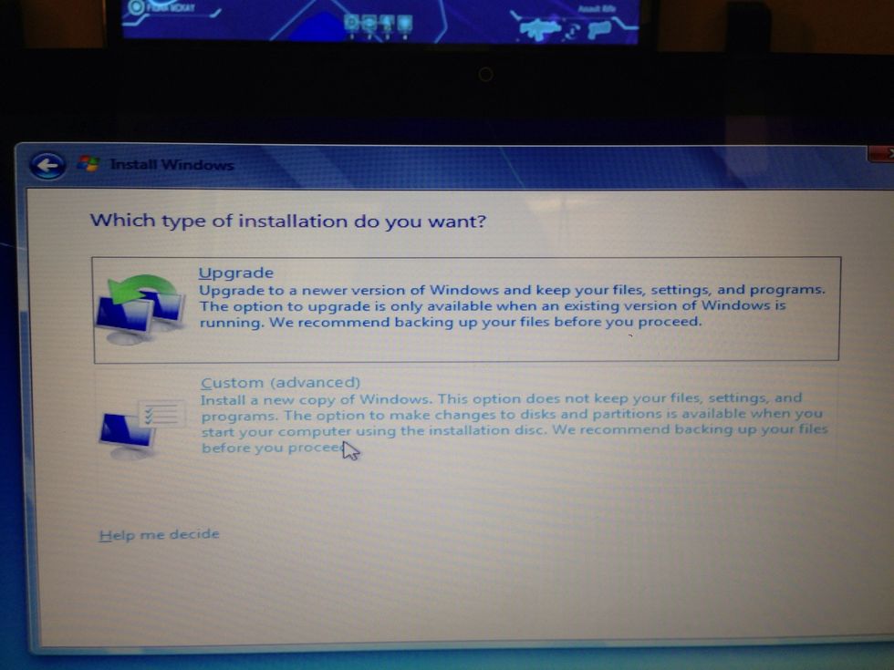 Move your mouse to the "custom" install and click.