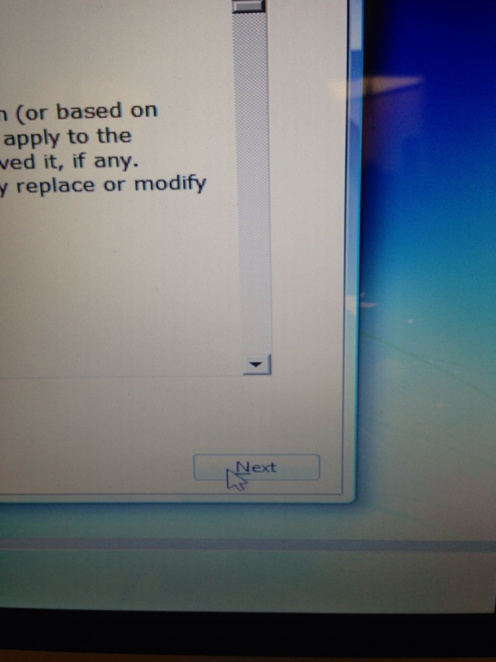 Move your mouse to the "next" button and click.