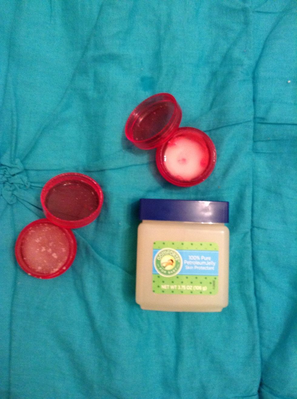 Moving on to lips... First, I use some of my homemade lip scrub to get rid of dead skin and chapped lips. I also apply my homemade liquid lip balm and lastly, some petroleum jelly.