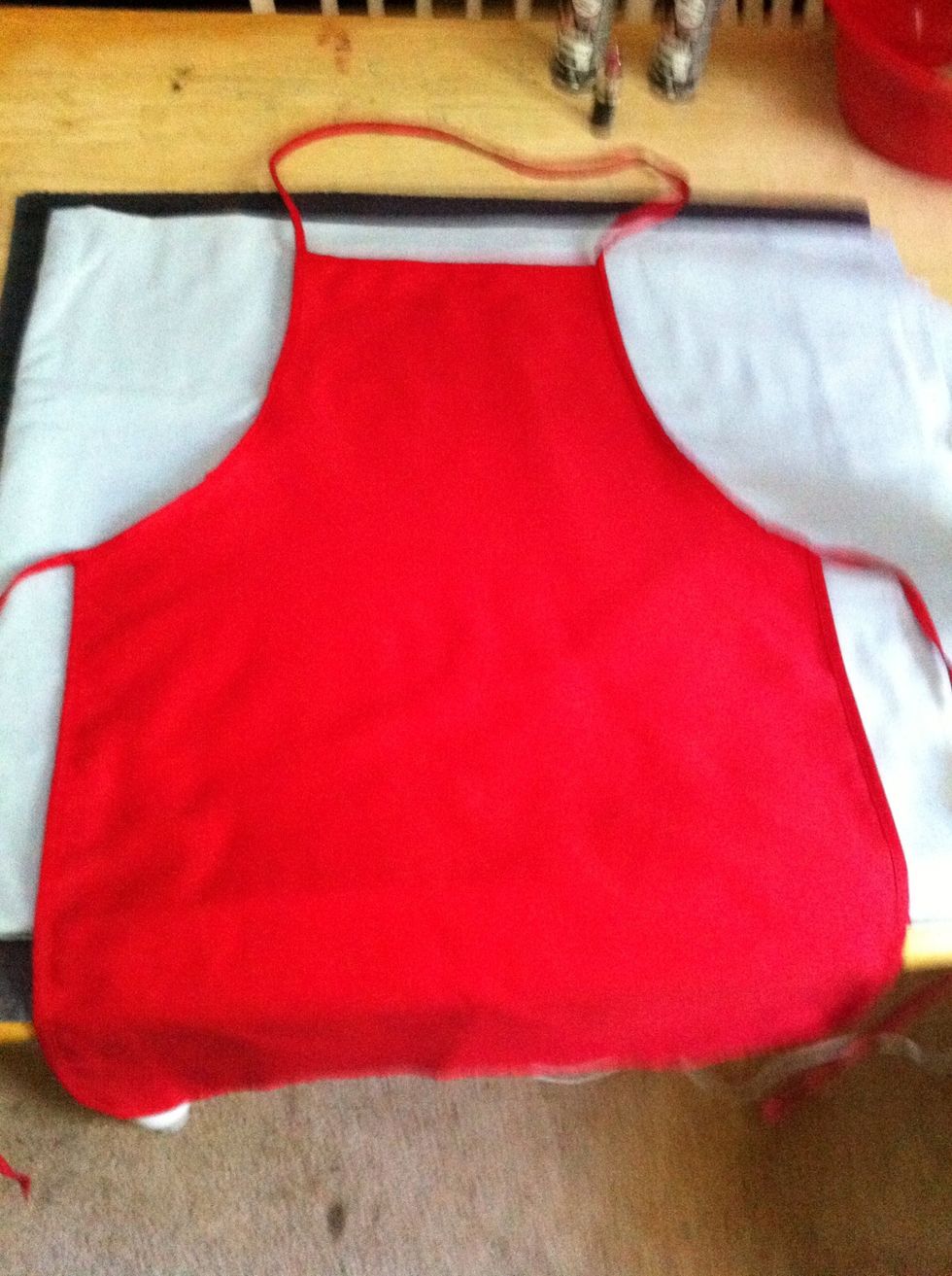 Ms Kay always wears her apron 'cause she's always a'cookin. We chose a red one.