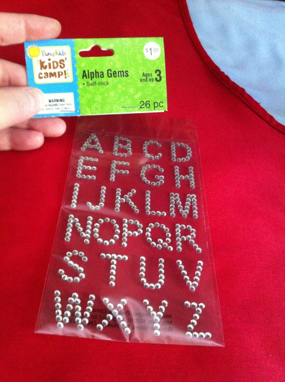 Ms Kay has her name on her apron. So we got some of the jeweled letter stickers. These will peel right off when you're no longer Ms Kay.\ud83d\ude09