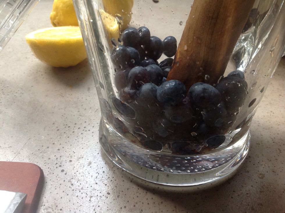 Muddle the shit out of 'em in a big pitcher with a big ole brute of a wooden pounding stick. Put it in, take it out. Repeat. Forever.