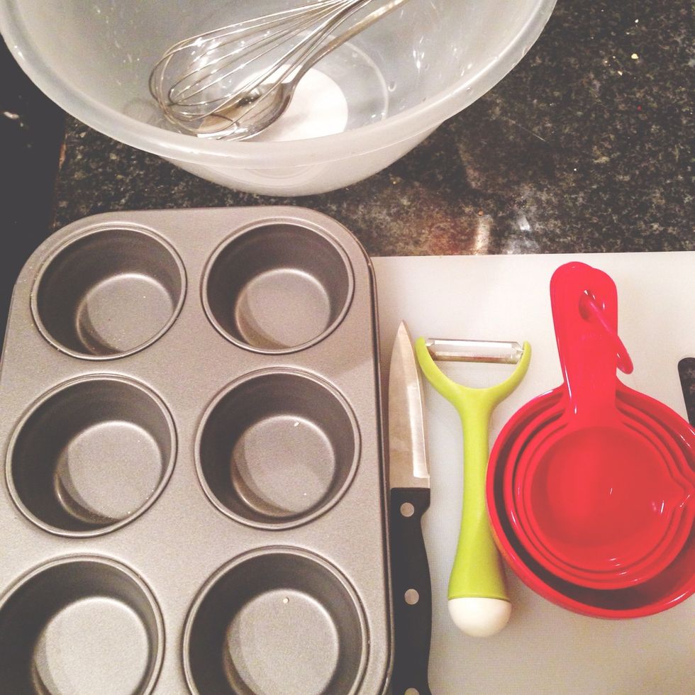 Muffin tray, cups, tablespoon, teaspoon, mandoline, chopping board, chopping knife, bowl, whisk or fork