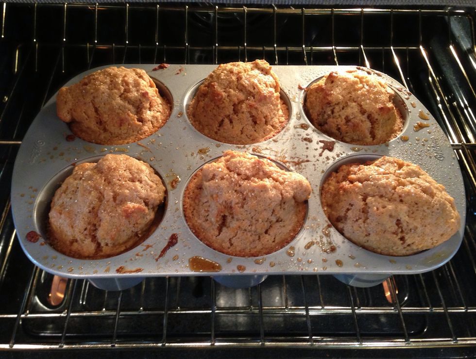 Muffins are done when you can insert a toothpick into the center and it comes out cleanly. I sprinkled some raw sugar on top.