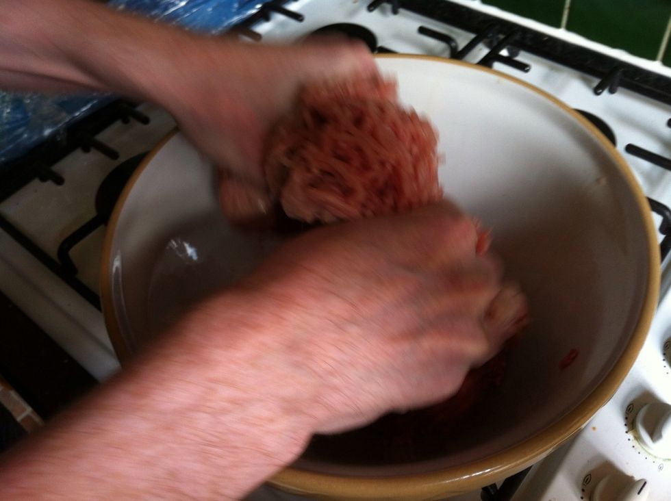Mush the pork and beef mince together with your hands.