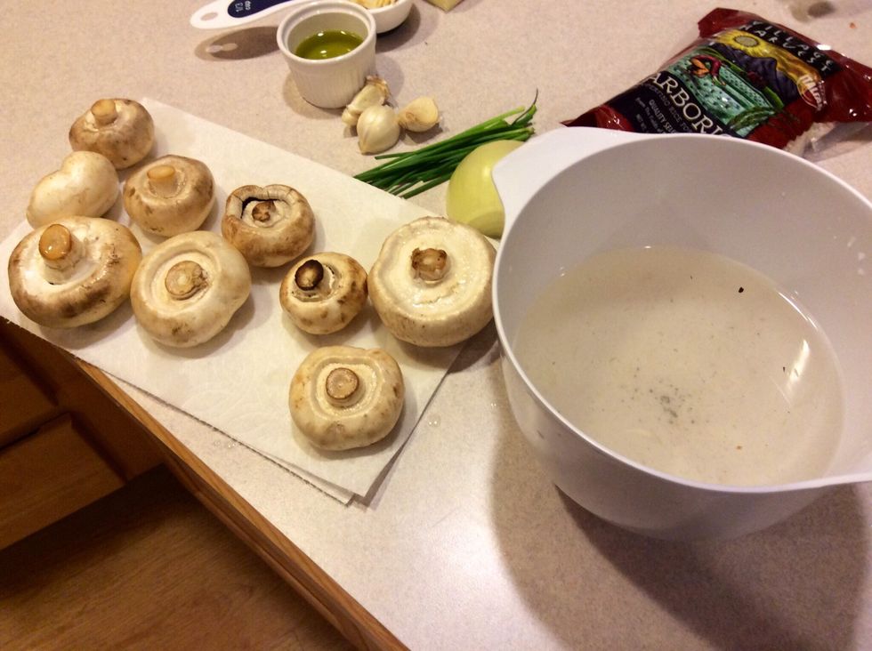 Mushrooms are porous and will soak up water. See how dirty the water is? Remove the mushrooms and place on a paper towel to dry.