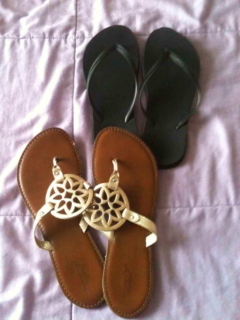 MUST HAVE! A pair of black old navy flip flops they go with anything and everything!! And COMFY but cute flip flops