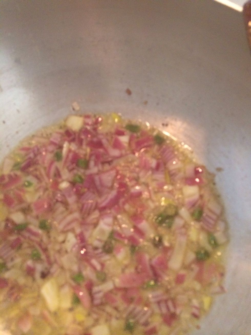 Mustard seeds, onions and green chillies