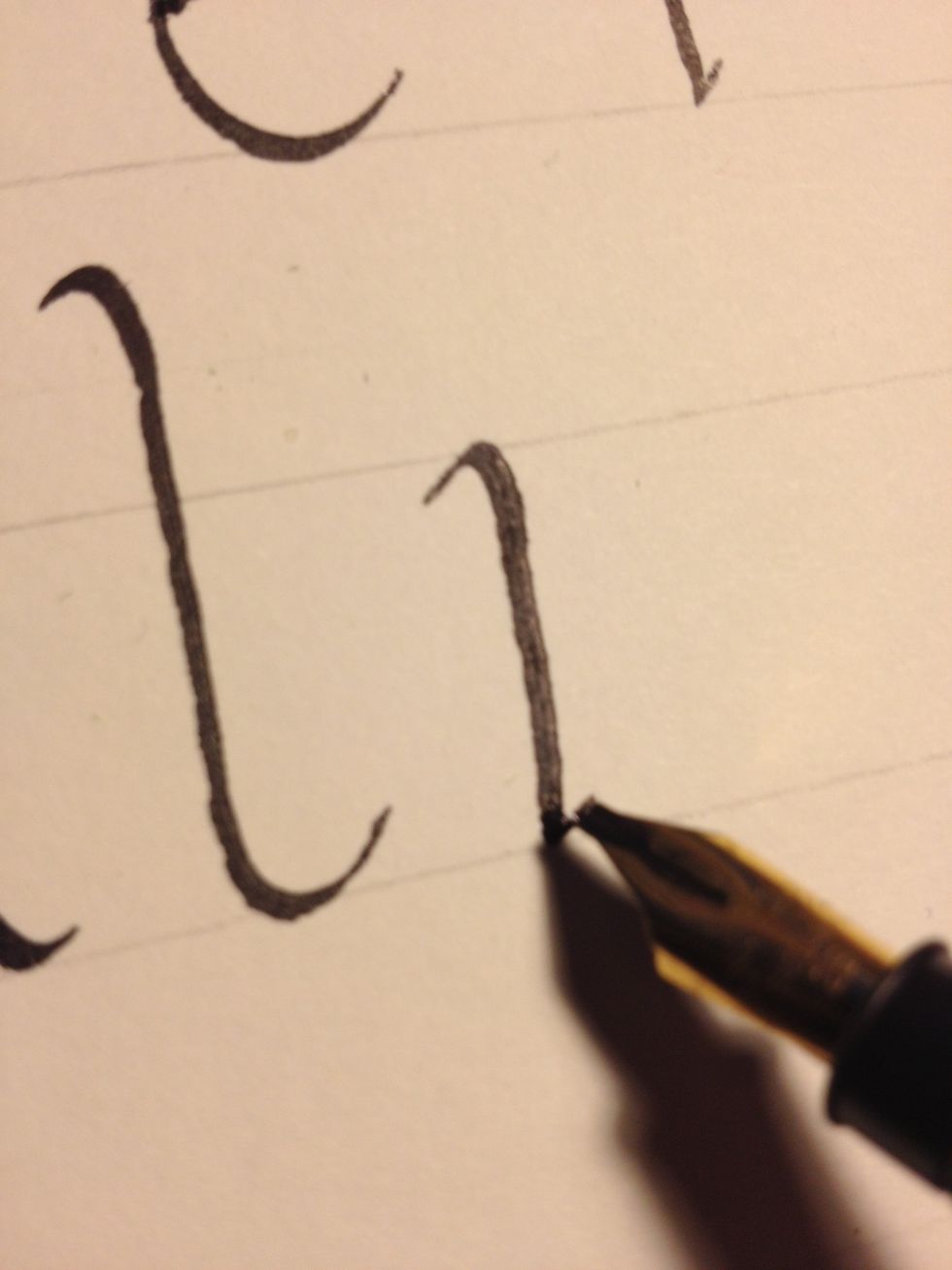 My apologies for being absent a few days longer than usual; I was very busy, but now I'm back! Anyway, start off "m" with a standard trunk, tics at top and bottom.