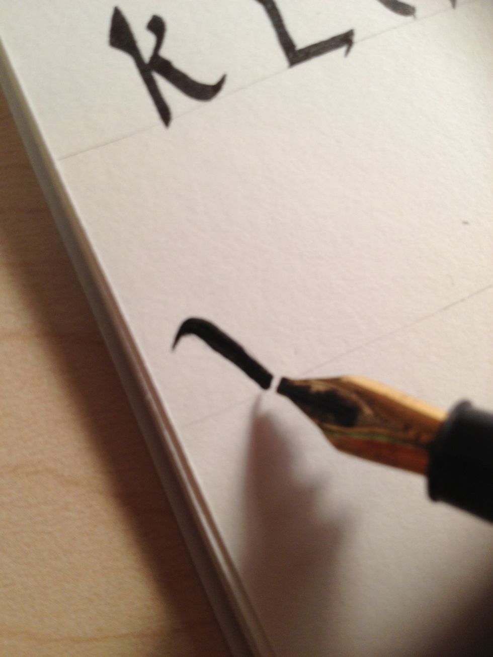 My apologies for the slight delay! Anyway, begin W with a downward diagonal stroke with a flourish at the top.