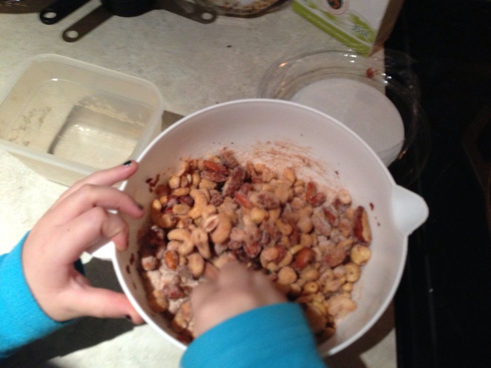 My assistant is lazy and is still wearing her pajamas!!! Stir the dry mixture into the nuts.