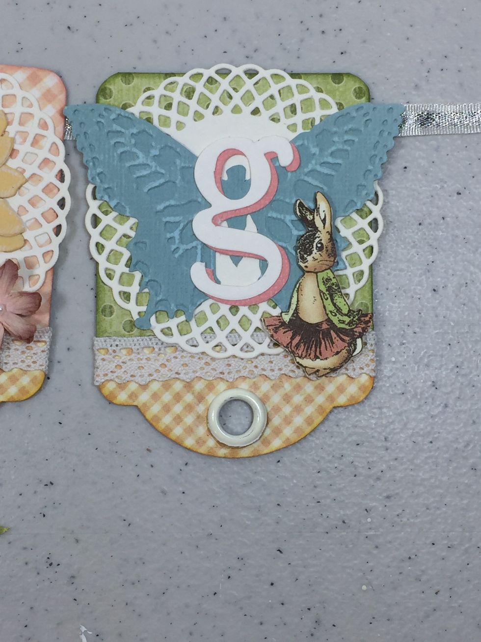 My banner tags are sweet and simple, but you can dress yours up with more flowers, pretty buttons or even some glitter!