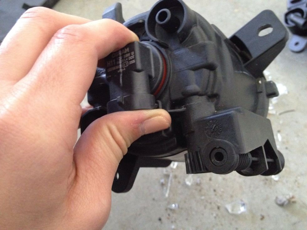 My bulb still functioned so I wanted to keep it for later use. Grab the back of the bulb and twist counter-clockwise.