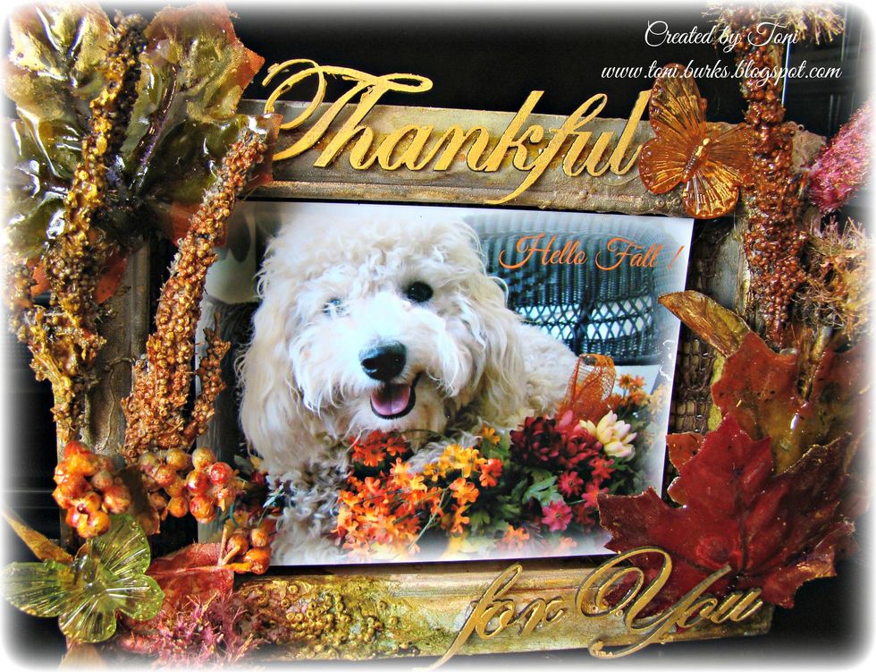 My chipboard piece was painted with two coats of Metal Effects Gold and adhered with glue gun.