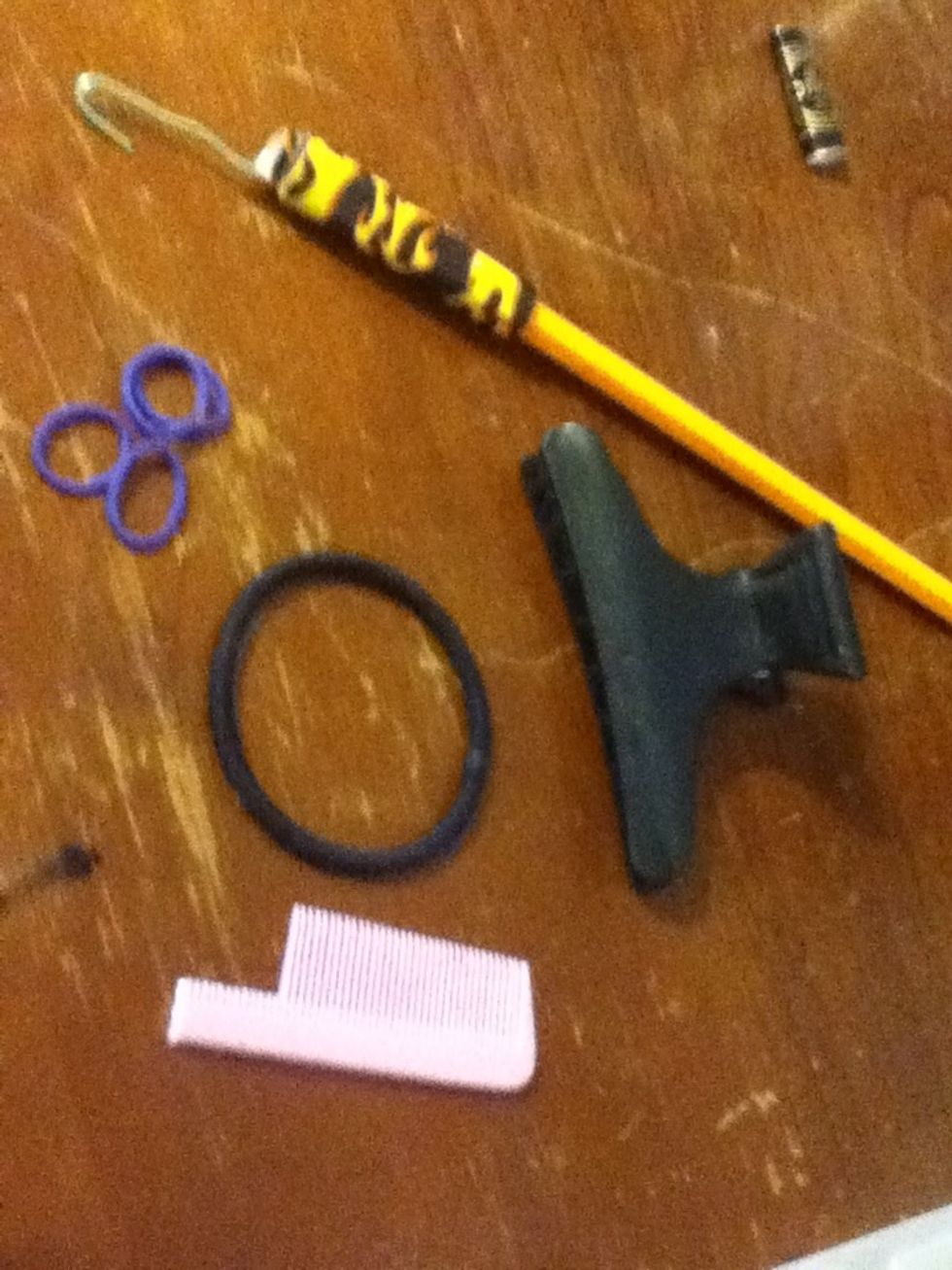 My combs always break so I've got this little bitty piece of a comb. Not shown: optional wax styling products.