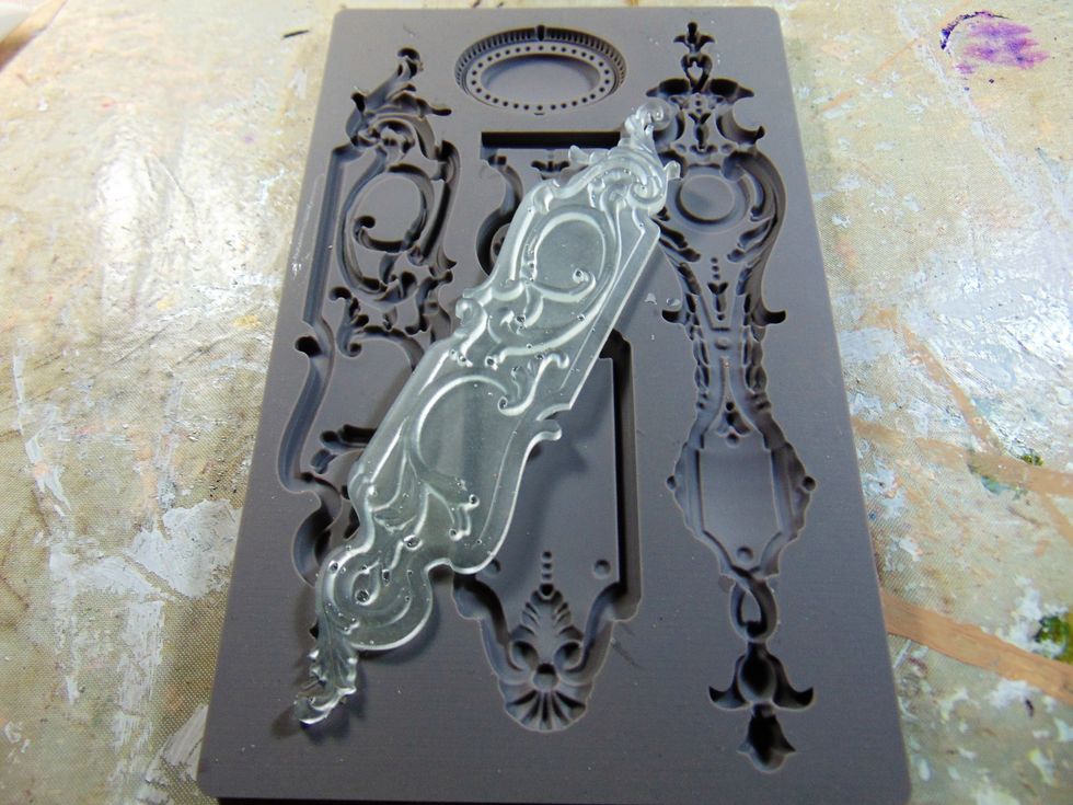 My detail on the sides of the hutch were Ice Resin pieces made in the Prima IOD moulds from last months kit. You need two of the same design.