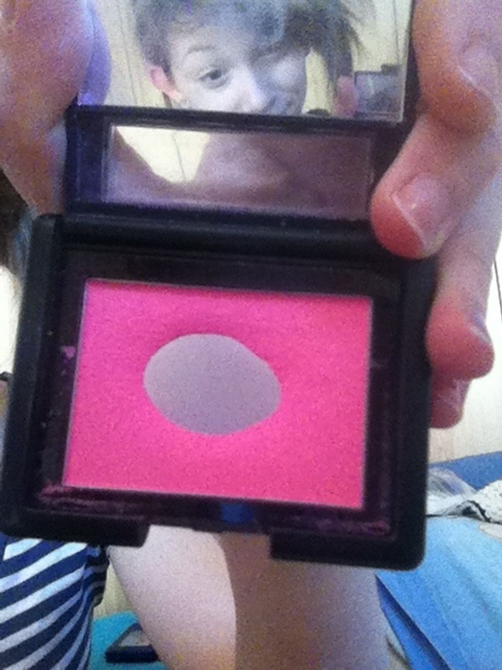 My FAVORITE blush by ELF cosmetics in pink passion. There i am awkwardly in the top mirror c: