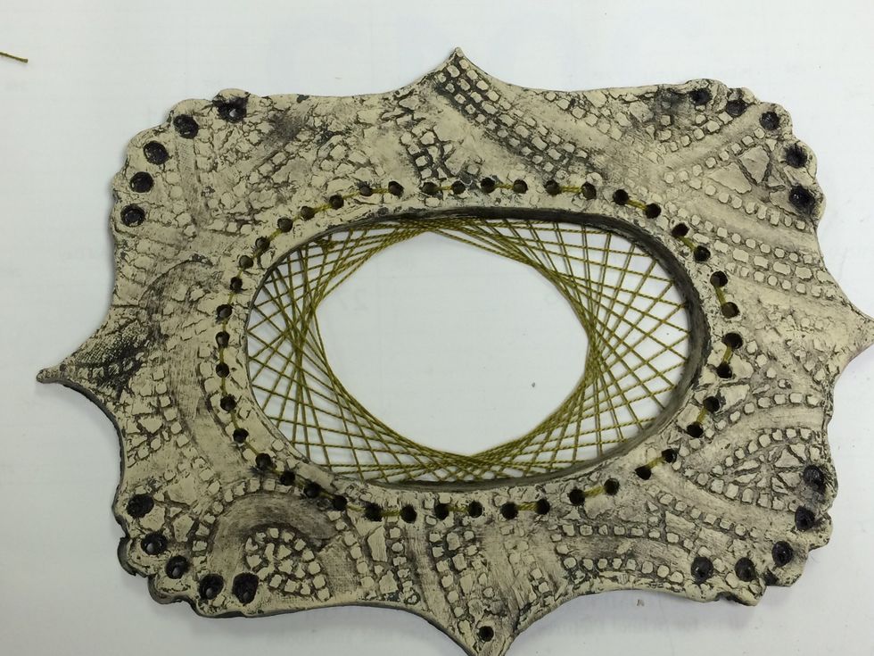 My first attempt is a bit Caddy Wompus.