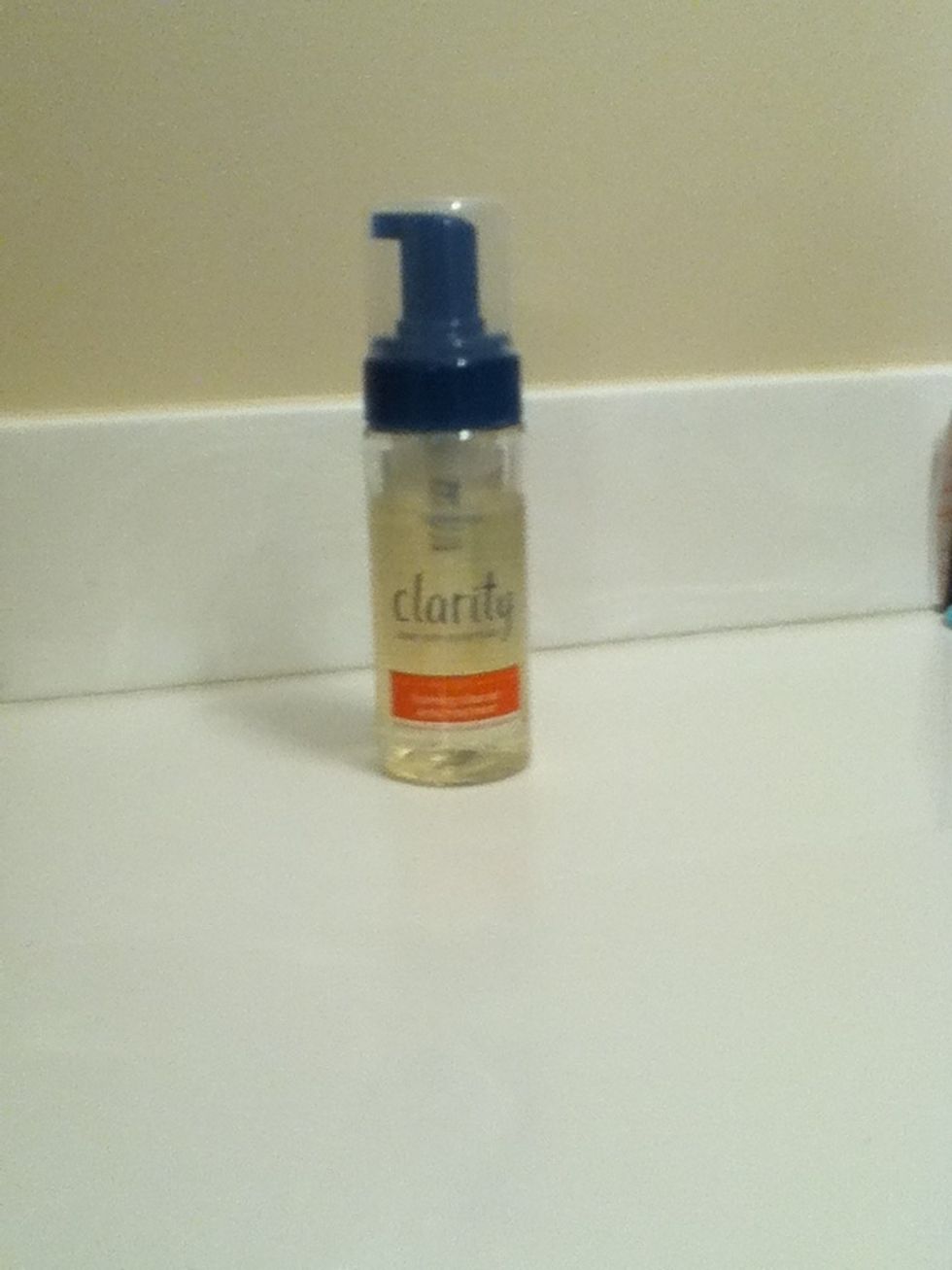 My first product is this foam cleanser. I gently rub a small amount of this on my face, wait for about 1 minute, and then wash it off. \ud83d\ude0a