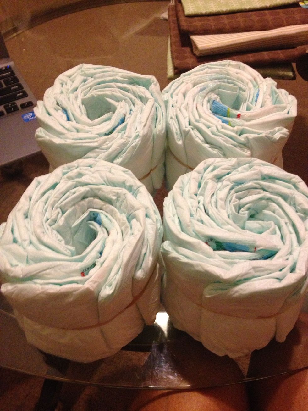 My four stroller diaper wheels. Try to keep a little hole in the middle and make sure they are straight and even.