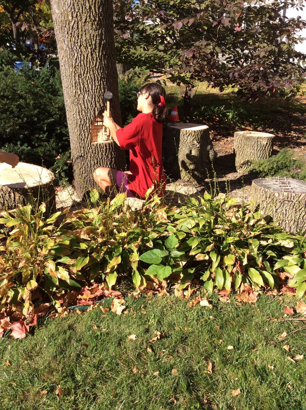 My Friend working on a fairy house