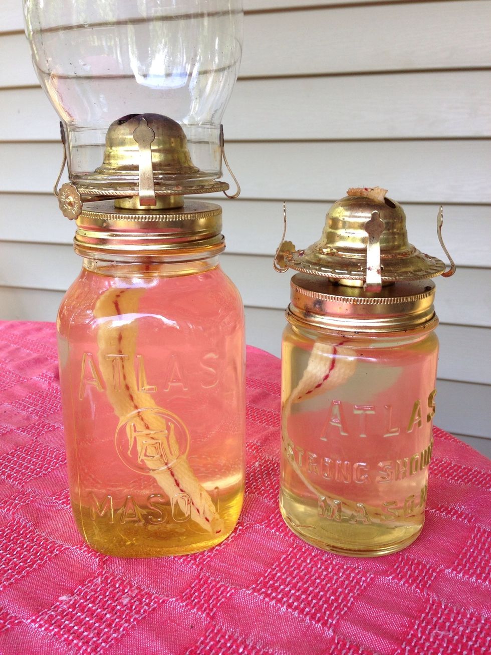 My heart was a flutter when I found these little oil lantern tops designed to convert any standard mason jar into an oil lamp! So much fun! I use citronella tiki torch oil. Glass lamps came separate.