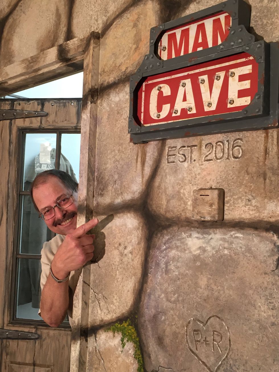My husband, best friend and fantastic wood-worker craftsman grinning from ear to ear with the results! He's still proudly showing his Man Cave entrance off months later!