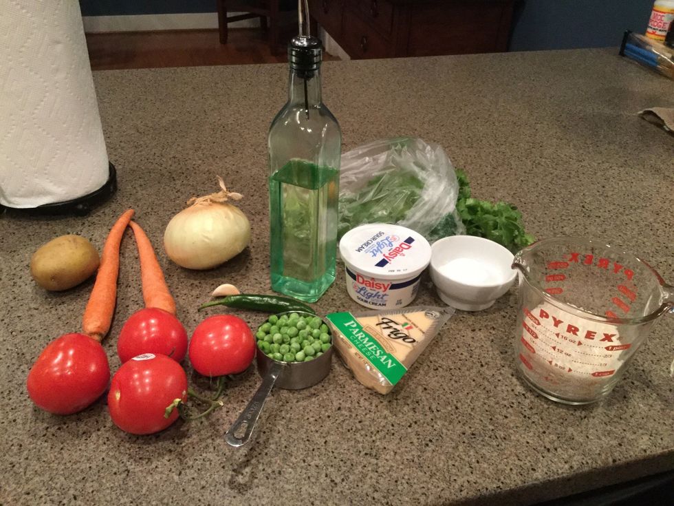 My ingredients: 1 c white rice, 4 tomatoes, 1/2 onion, 1 clove garlic, olive oil, 1/2 c green peas, 2 carrots, 1 potato, 1/2 c sour cream, 1 bunch cilantro, 1 serrano pepper, 4 oz parmesan cheese