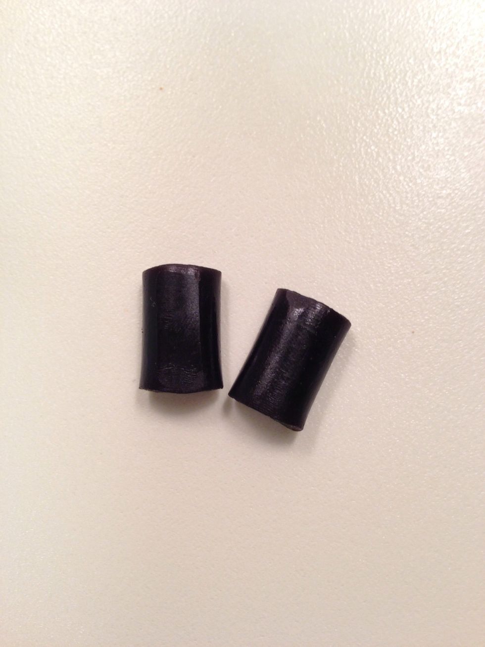 My licorice candies were small so I took two and stuck them together with a little melted chocolate.