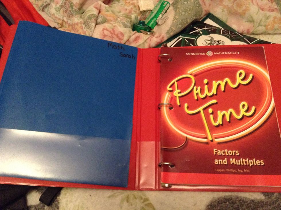 My math teacher gave everybody a red binder for our mathbooks. I hated the idea of loose papers in it, so I got a blue folder and tucked it in.