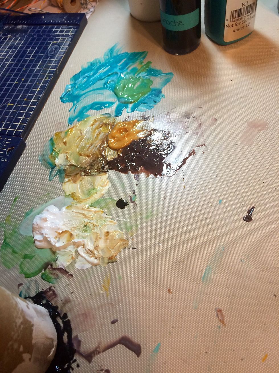 My mixing palette directly on my Art Anthology mat.  Believe it or not, this will clean up spic-n-span!