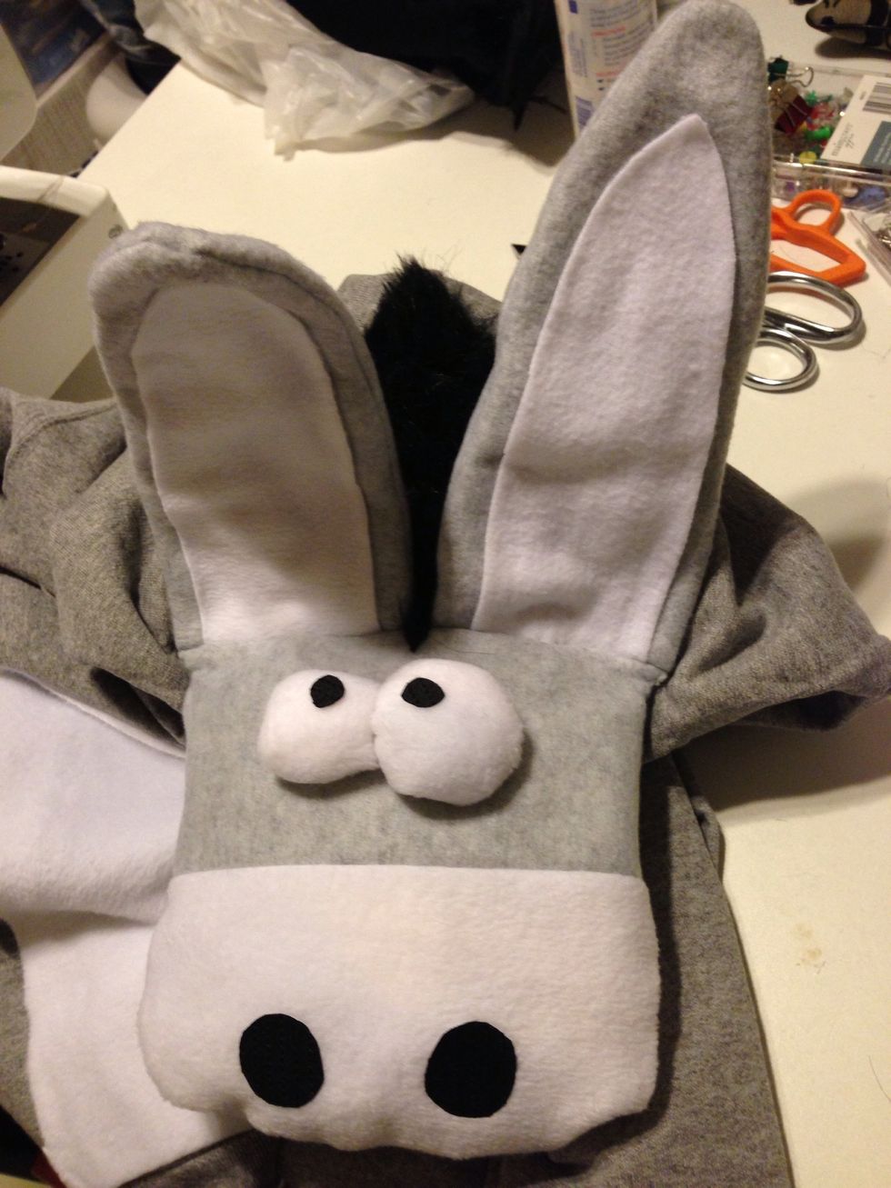 My model (bf) tried it on and i noticed the ears were still flopping a little too much so to fix this - take some glue and behind the bottom of the ear (back) glue an inch down