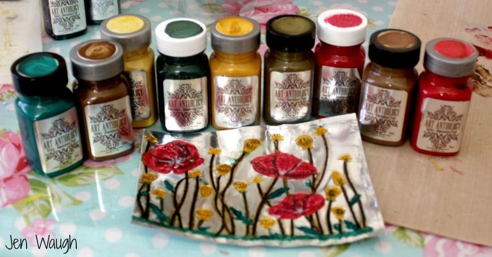 My painting is finished, now to add to my journal. The foil sheets are self adhesive so just lace where you want it.