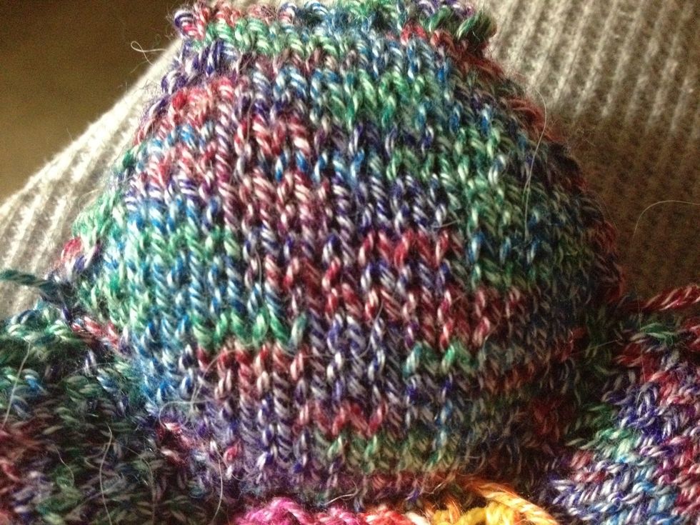 My puffs are knitted using leftover sock yarn, with US 3, and are about 2.5 inches across (measuring side-to-side, NOT point-to-point).