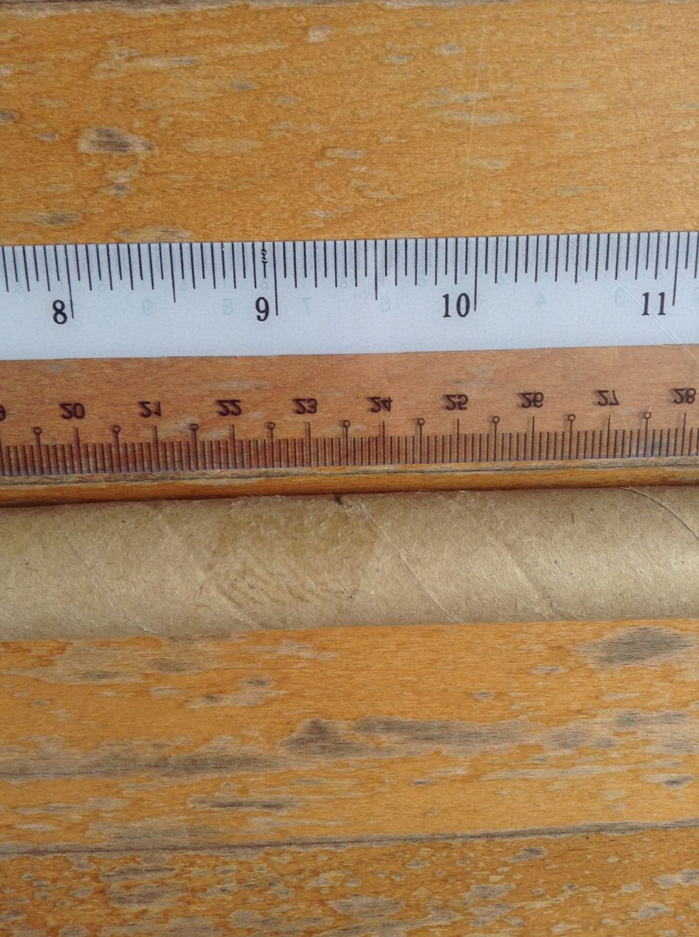 My rod measures 46.75 cm, so I marked the 23.375 cm mark on my rod, that is the center.
