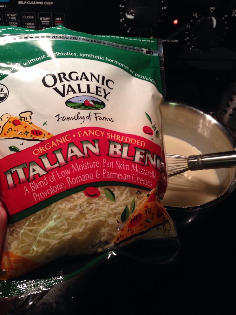 My shortcut! I use entire bag (6ozs) of organic Italian blend shredded cheese.