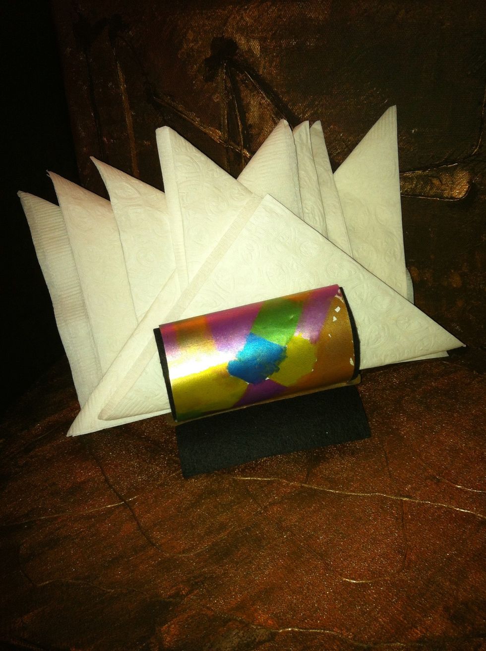 My son made this metallic design. He also arranged the napkins.