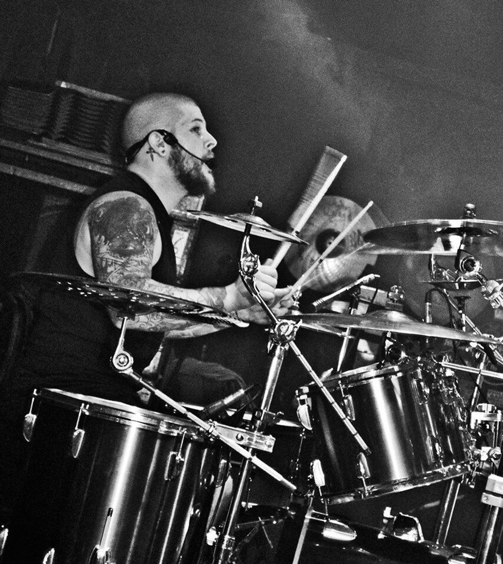 My sons playing drums at a show.