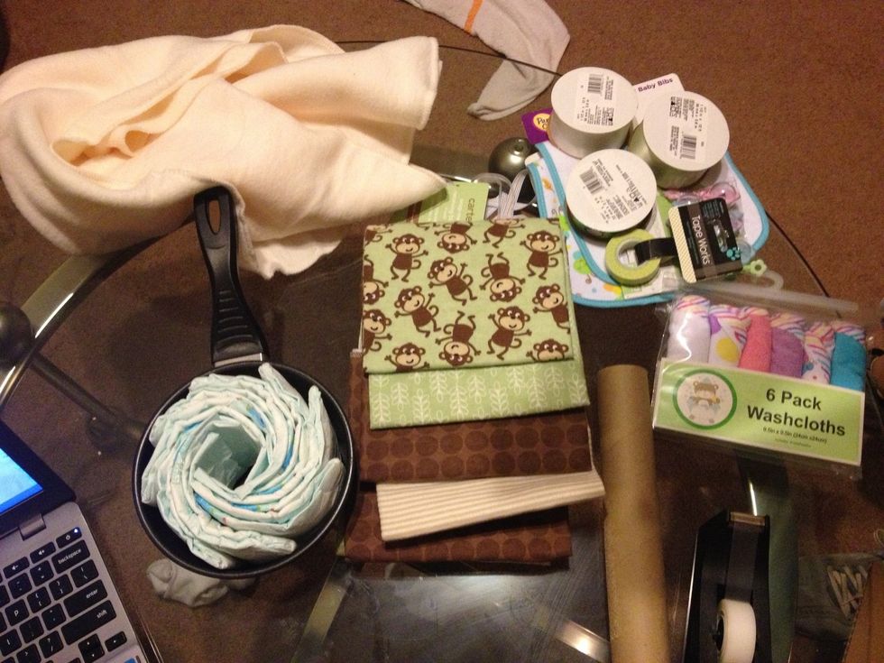 My supplies. I chose these colors because my brother and sister in law are waiting to find out the sex of the baby. Animal theme is always a safe bet for colors.