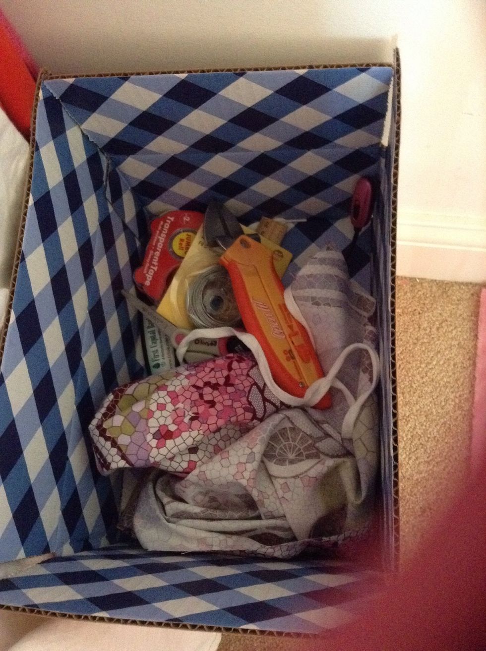 My supply box for when I make a guide. It's includes tape, scissors, a light, fabric, a ruler, and a few more things.\ud83d\udce6
