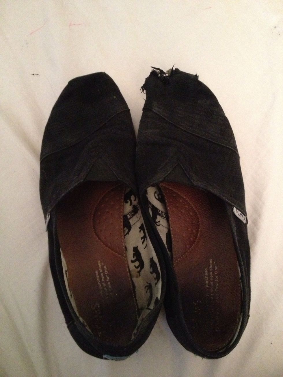 My well loved pair of toms. I go to private school where we have to wear black flats everyday, so lots of us girls just wear toms.