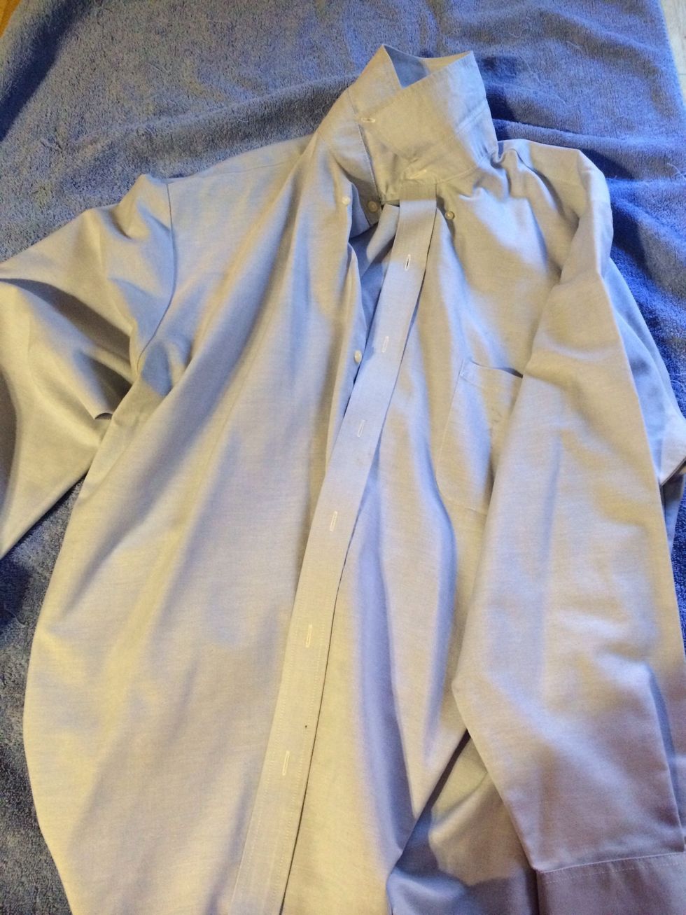 My Zombie needs some clothes. Grab something that can be trashed later. Zombie clothes can be anything..a business suit, sports uniform, a tutu costume. Be as creative as you want.