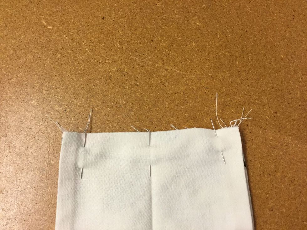 N\u00e5la nu ihop handtagen r\u00e4tsida mot r\u00e4tsida och sy ihop.