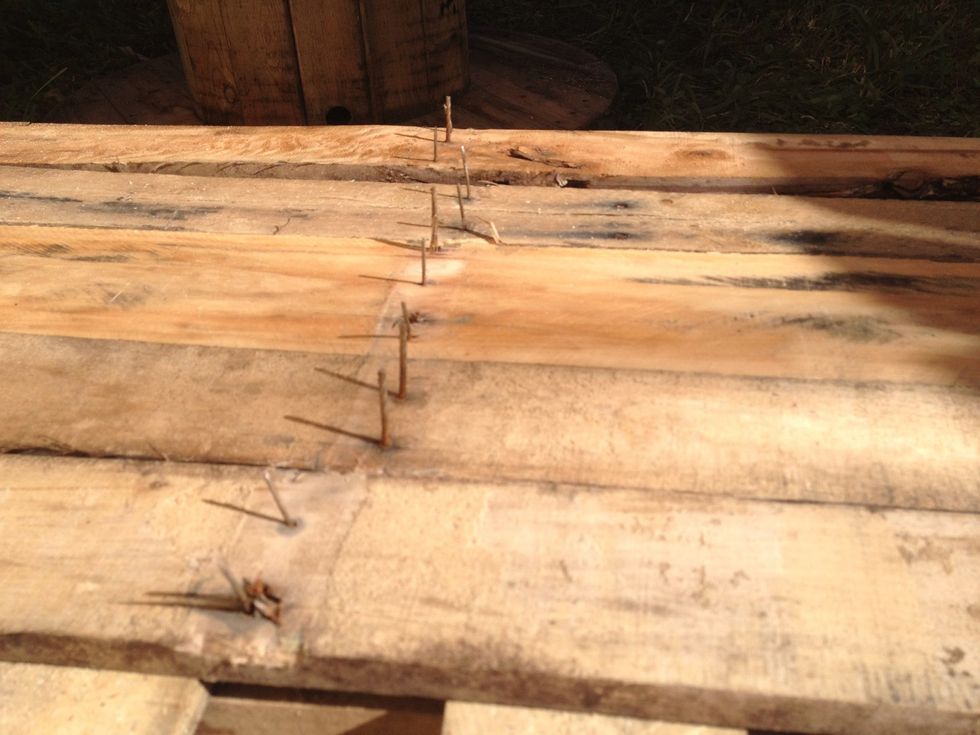 Nails up on all the removed boards, then used a hammed to drive them backwards through